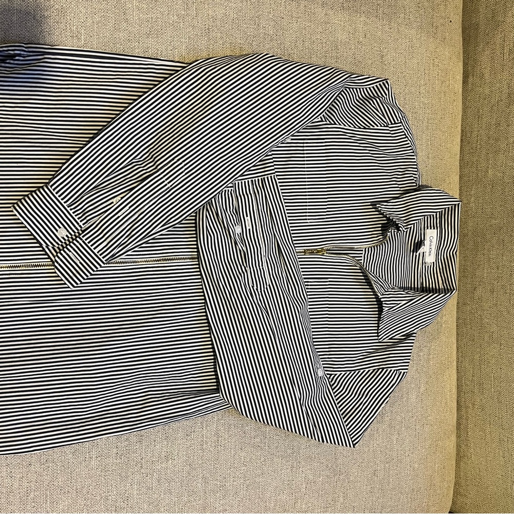 Calvin Klein women’s dress shirt with zipper, thin stripe.